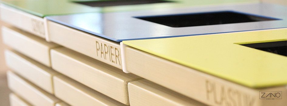 Kanta za recikliranje s rezačima koji opisuju odvajanje otpada